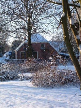 Huisje in de sneeuw